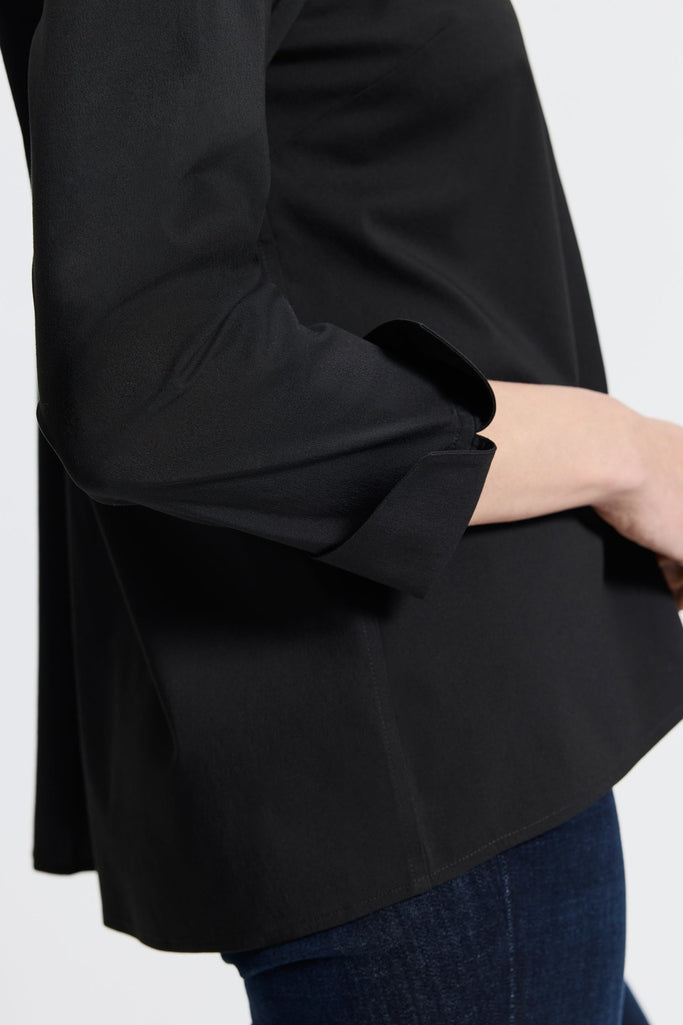 Woman in Foxcroft Agnes black non-iron shirt styled for modern versatility and a timeless look. #color_black