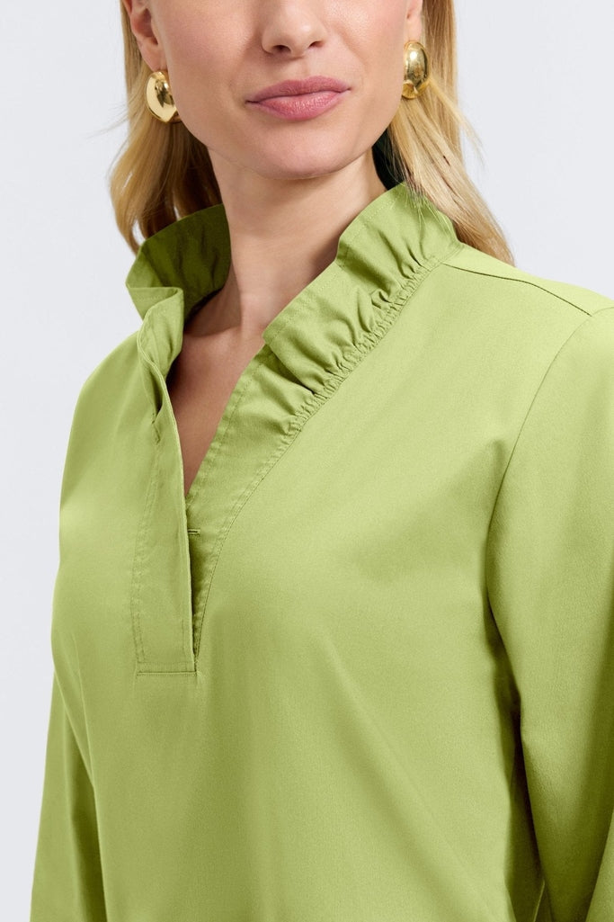 Angled close up of the ruffle neckline on the Tammy No Iron Stretch Long Sleeve Popover Shirt #color_celery