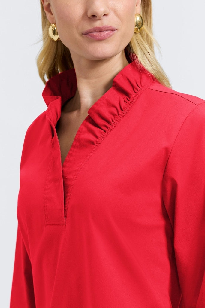 Angled close up view of he ruffle neckline on the Tammy No Iron Stretch Long Sleeve Popover Shirt #color_simply red