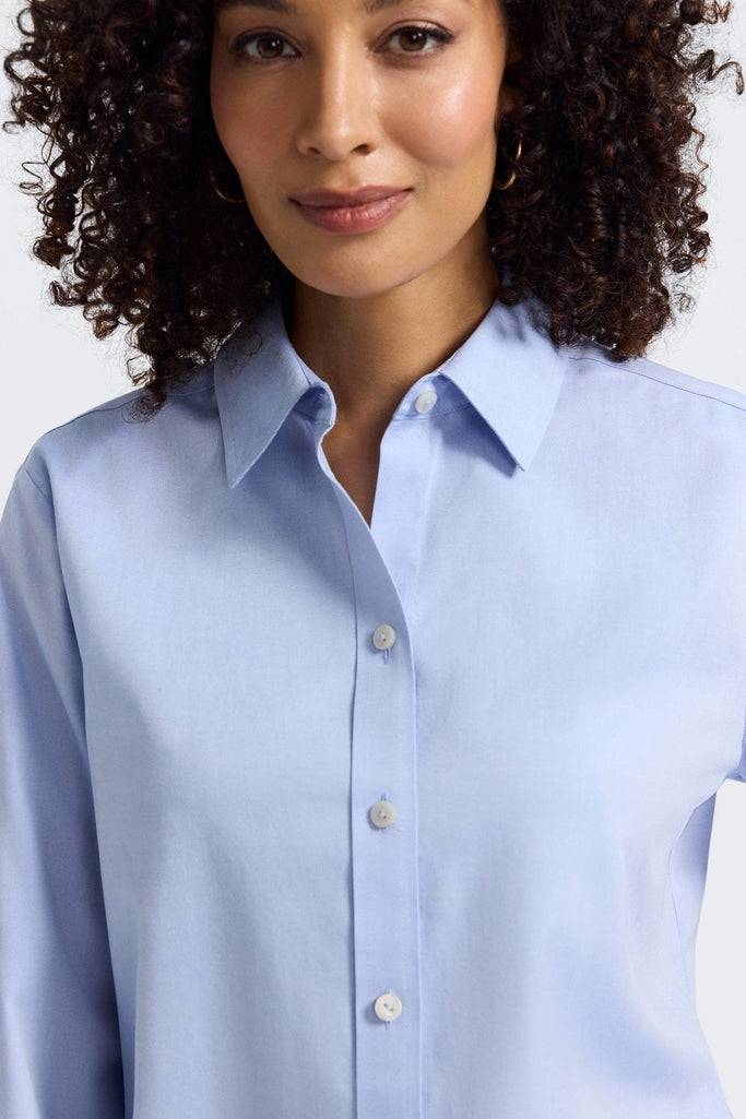 Close up front view of the collar and neckline of the Meghan No Iron Pinpoint Long Sleeve Shirt #color_blue wave