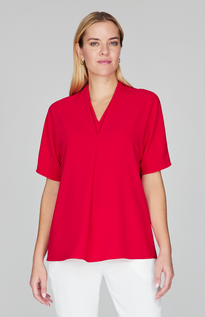 Gabby is 5'10" and wearing Ruby in size XS.
