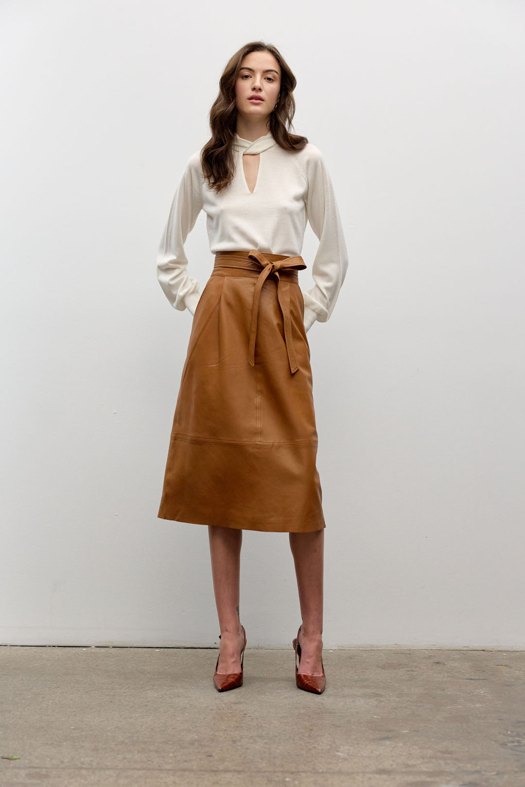 Pleated front A-line lamb leather skirt