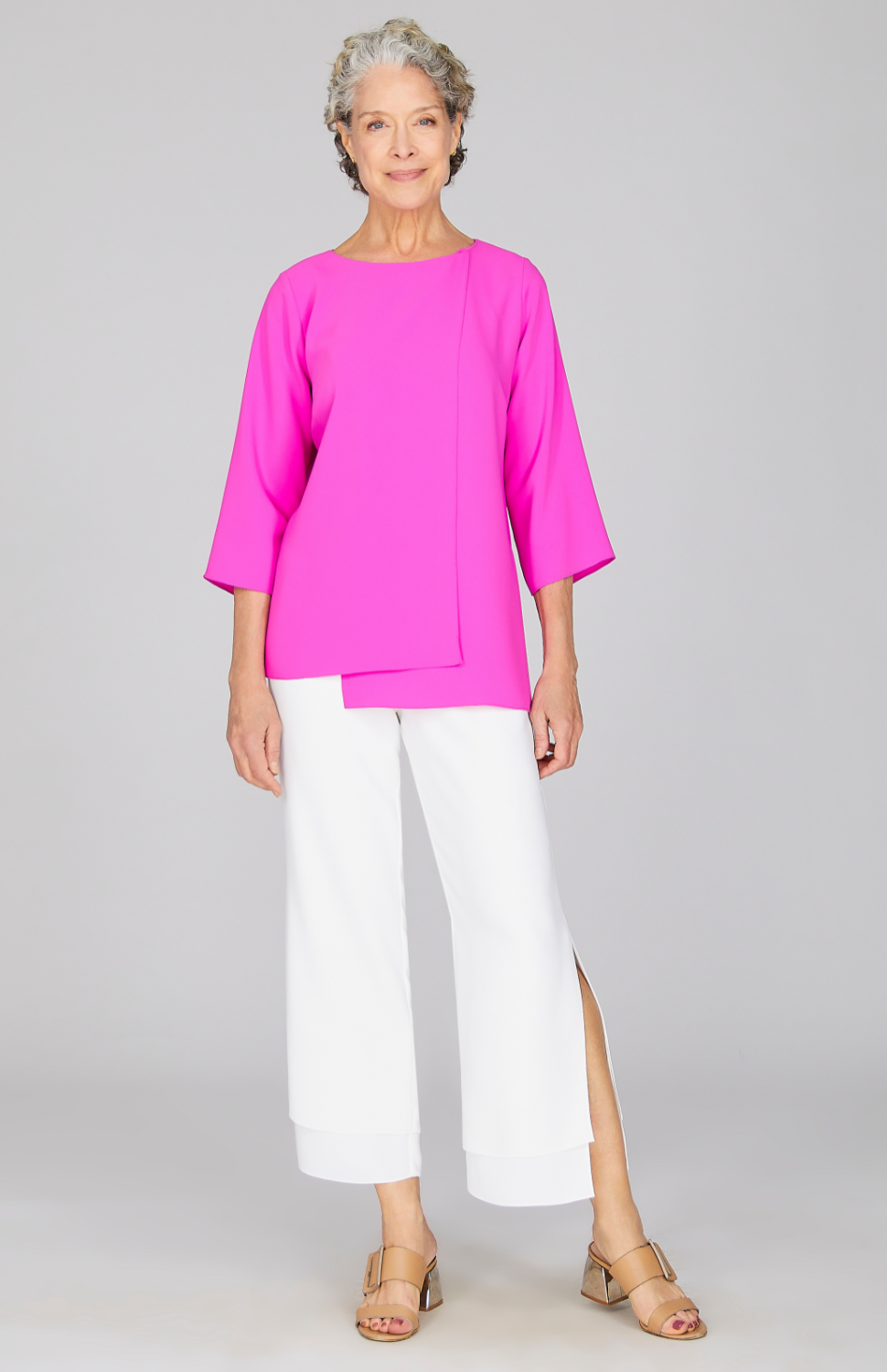 Nancy is 5'10" and wearing a size XS in Pearl.