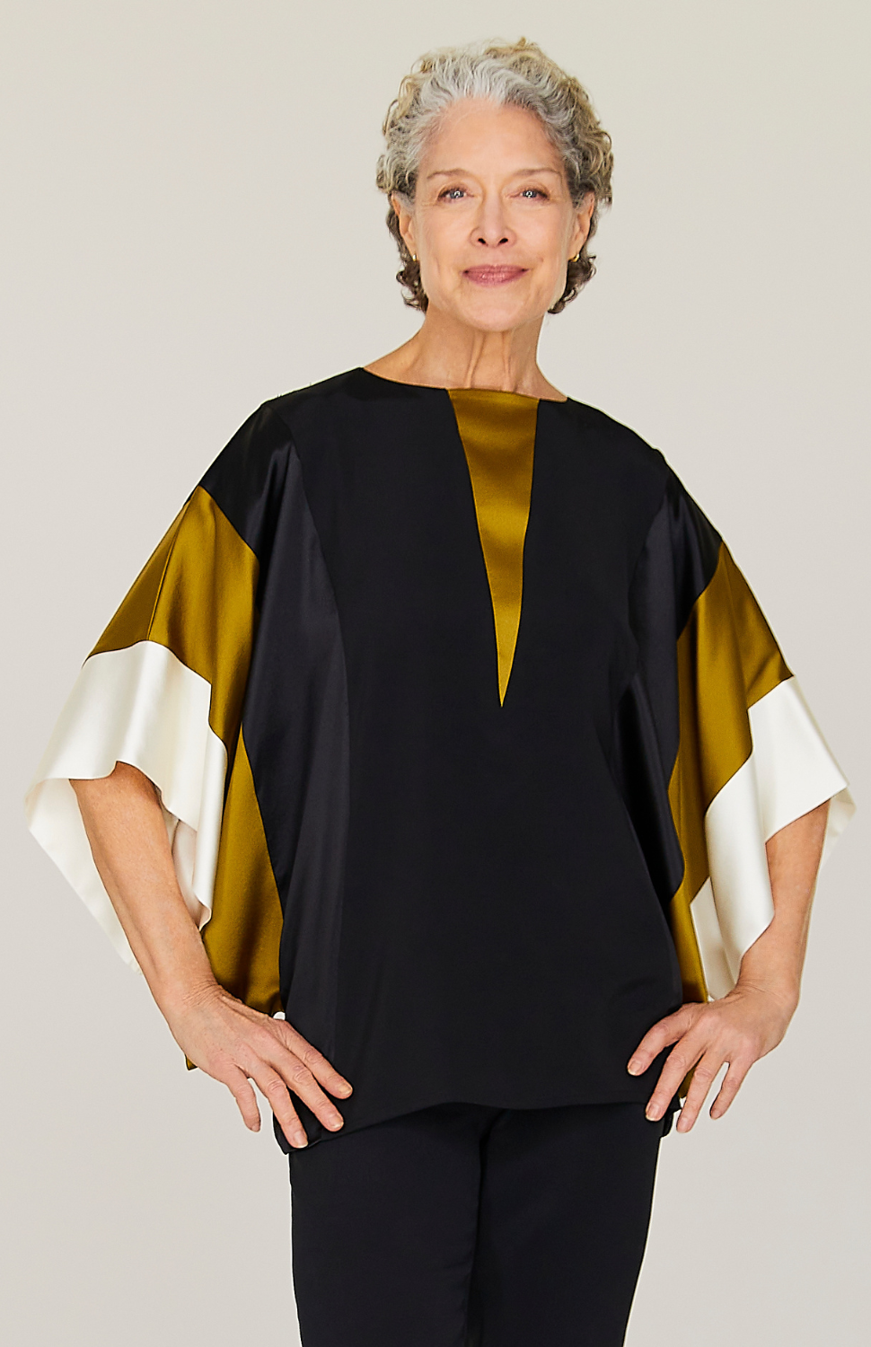 Nancy is 5'10 and wearing Luster 2 in size 00.