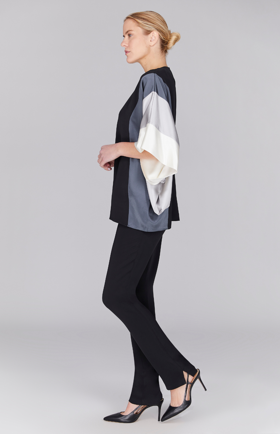 Gabby is 5'10 and wearing Moonlight in size 00.