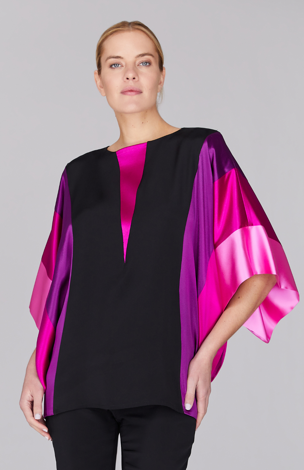 Gabby is 5'10 and wearing Orchid in size 00.