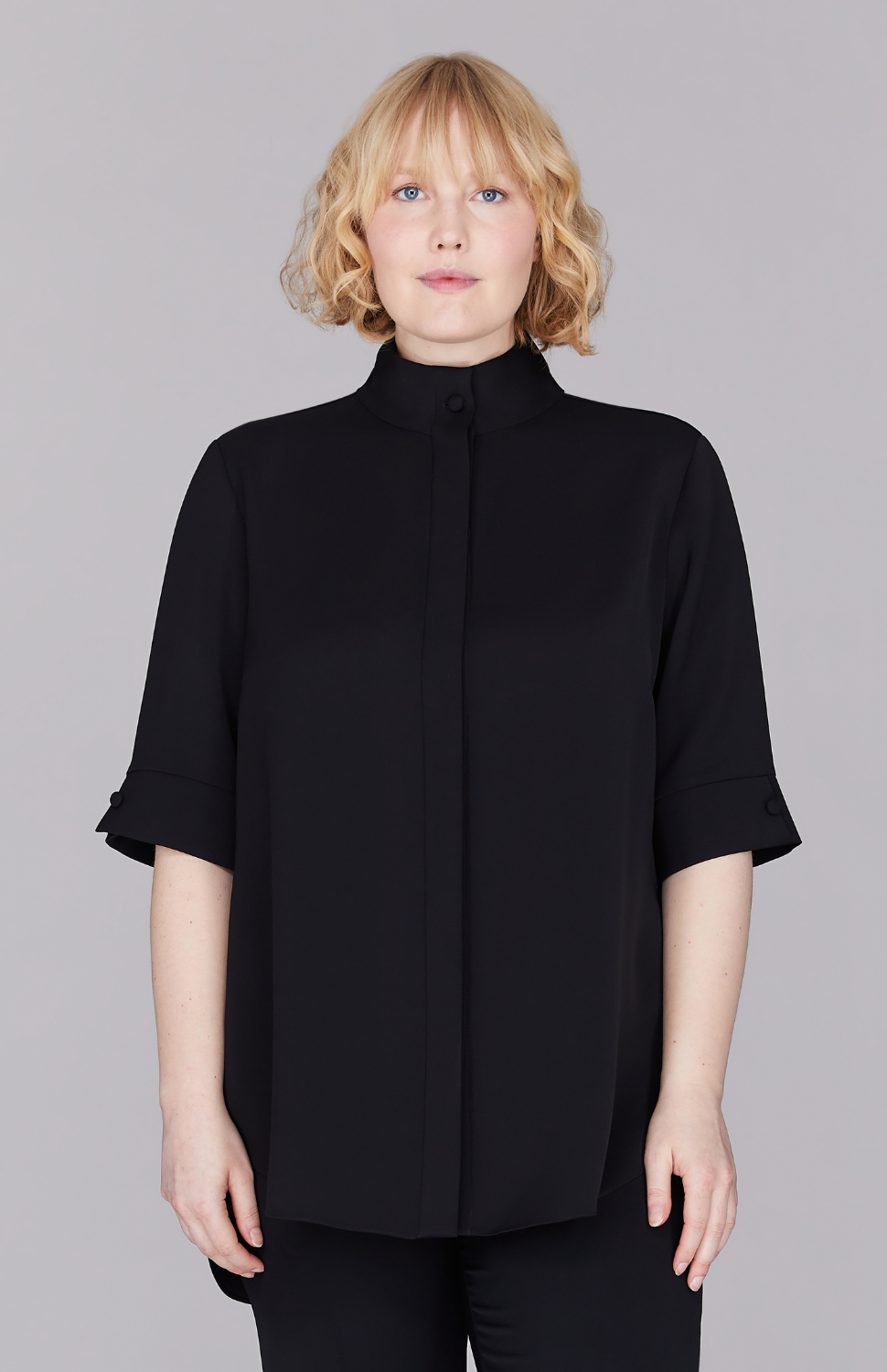 Molly is 5'8.5" and wearing Black in M.