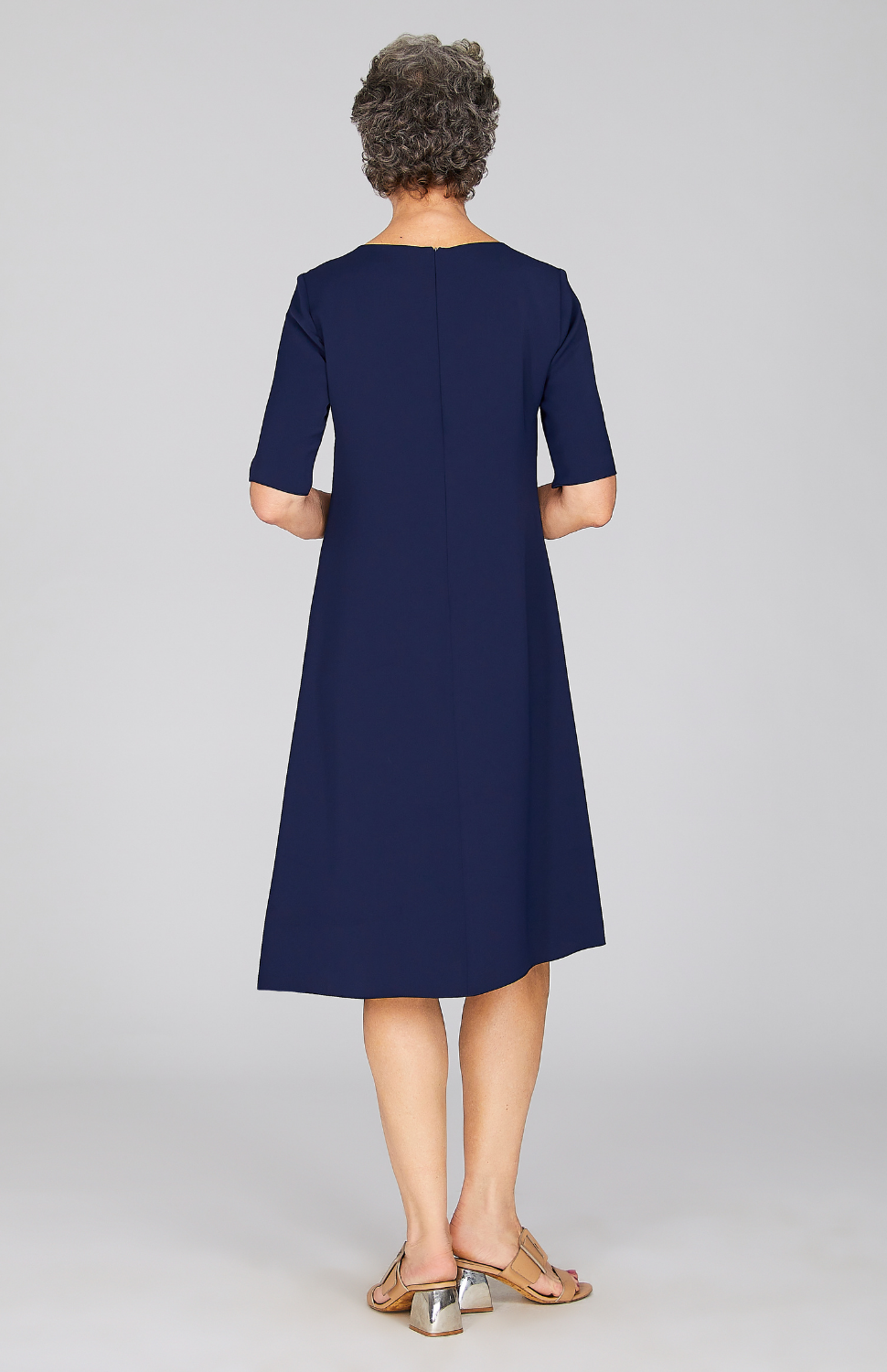 Molly is 5'8.5" and wearing Midnight in M.