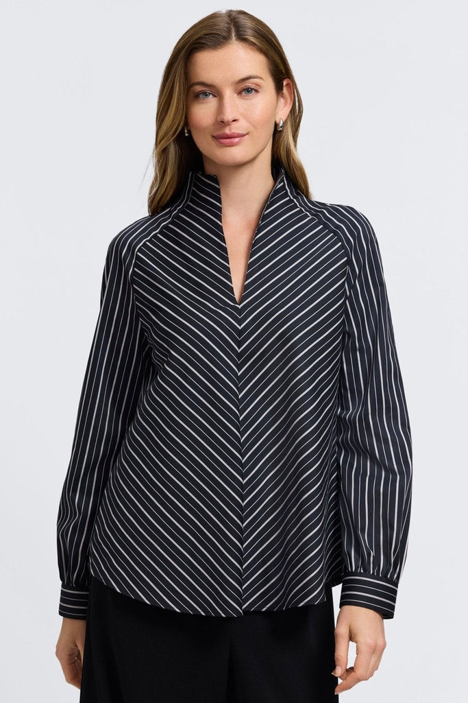 Front view of model wearing the Daphne Classic Wide Stripe Long Sleeve Popover Shirt matched with black pants #color_black & white wide stripe