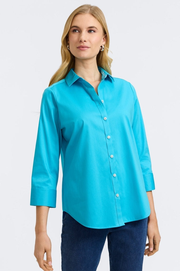 Front view of a woman wearing Margie Stretch Matte Sateen 3/4 Sleeve Shirt
#color_ibiza turq