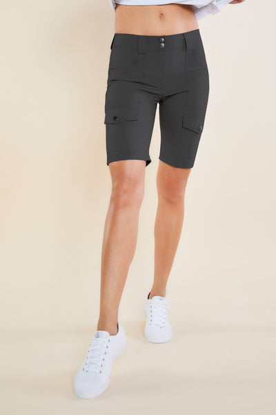 The Best Travel Shorts. Woman Showing the Front Profile of an Apiedi Shorts in Grey.