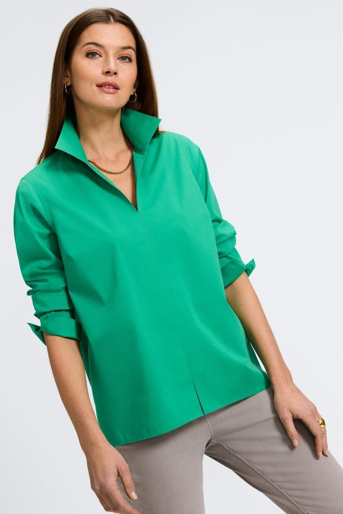 Woman in Foxcroft Agnes black wrinkle-free shirt designed for modern polish and everyday ease. #color_kelly green