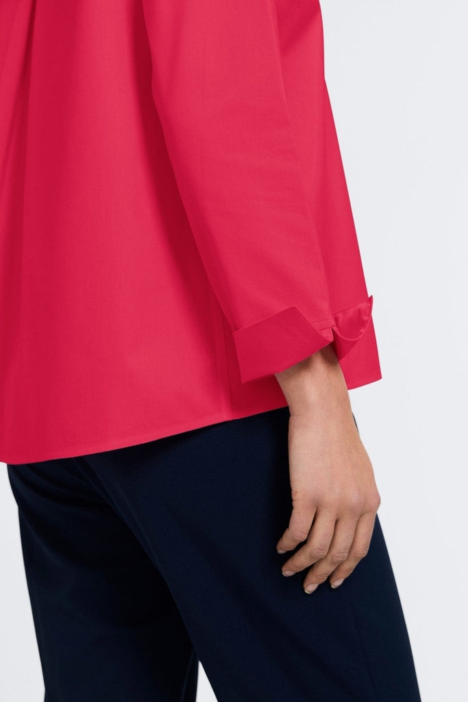 Close-up of the sleeves and flip back cuffs of the Agnes popover shirt #color_raspberry