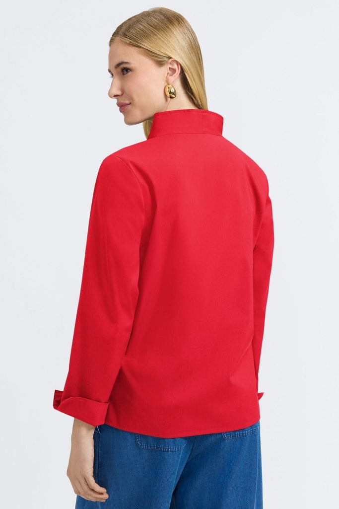 Angled back view of woman wearing the Tammy No Iron Stretch Long Sleeve Popover Shirt #color_simply red