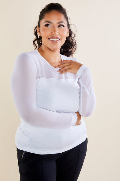 The Best Travel Shirt. Woman Showing the Front Profile of a Budah Mesh Pima Cotton Shirt in White