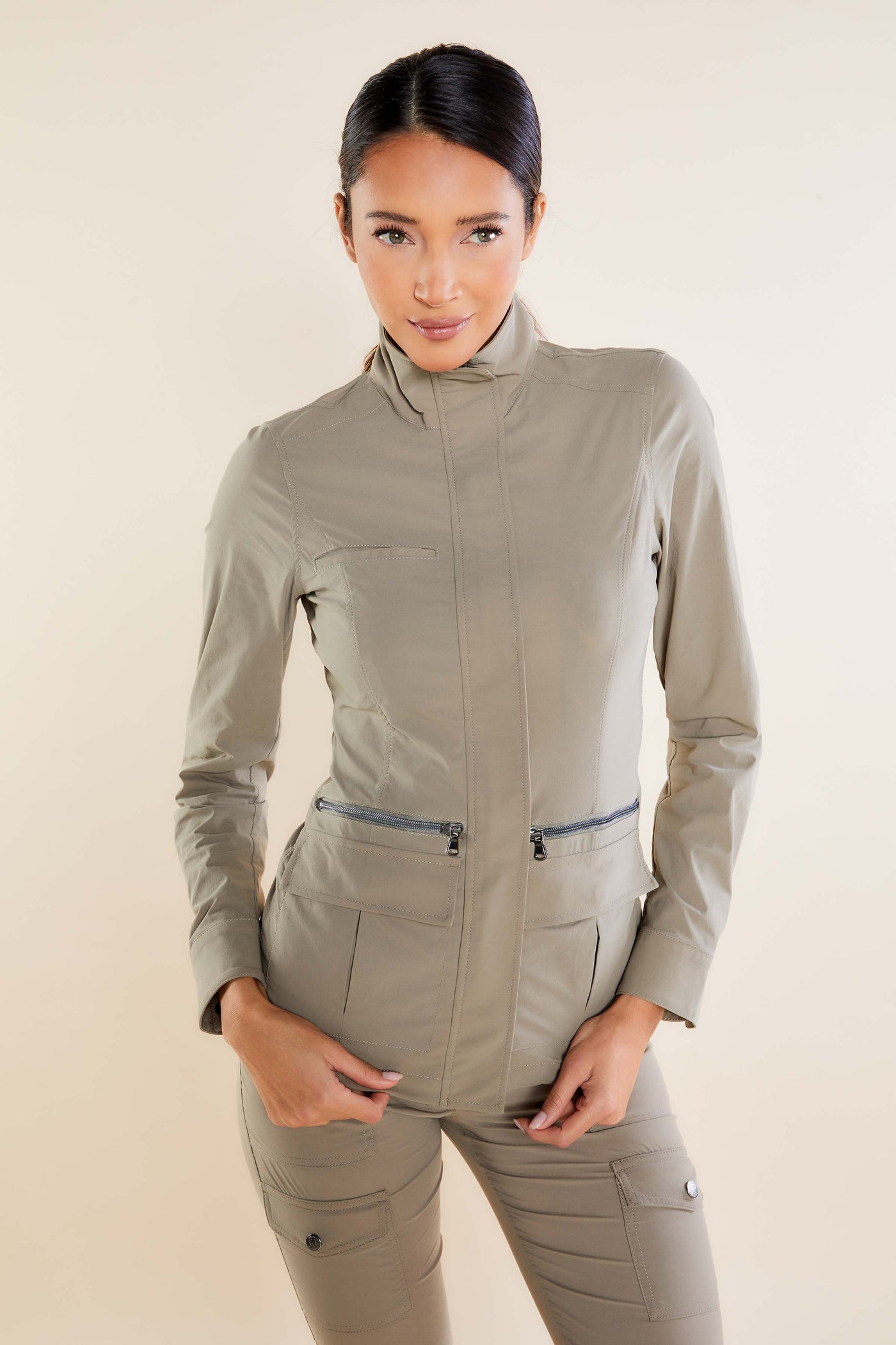 The Best Travel Safari Jacket. Woman Showing the Front Profile of a Safari Jacket in Khaki ||