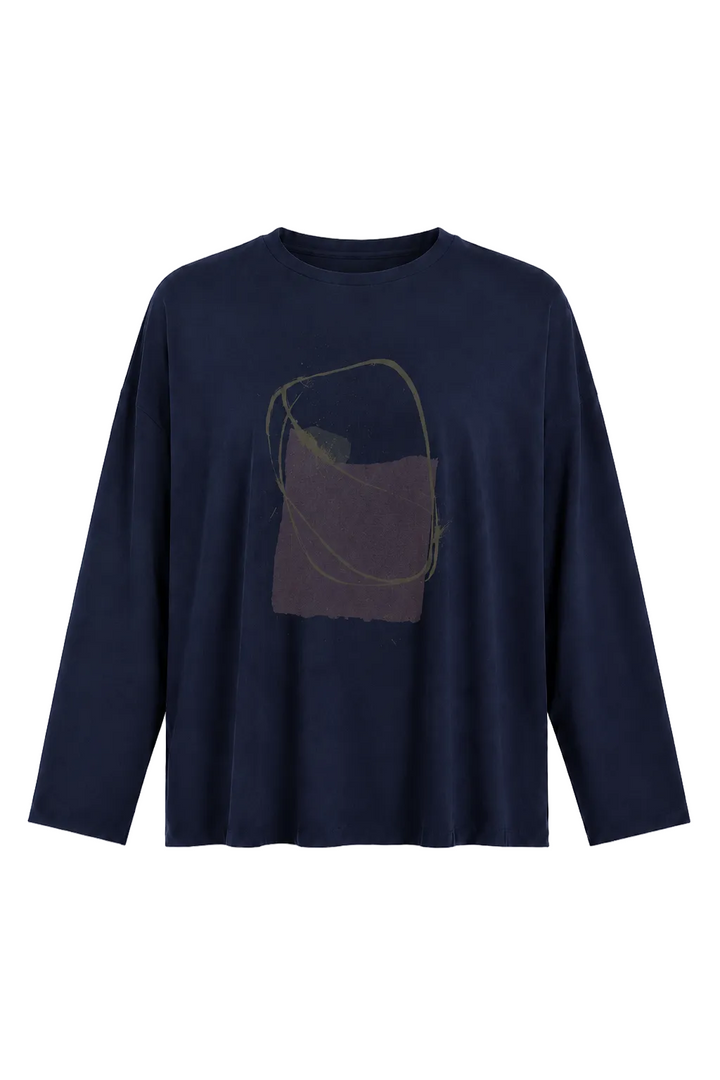 A 100% pima cotton navy blue long-sleeve crewneck t-shirt featuring an abstract graphic print on the front with a muted purple pocket illustration and olive-green lines, shown against a plain white background.