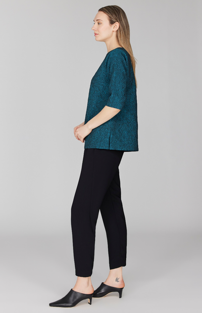 Morgan is 5' 11" and wearing Turquoise in size XS.