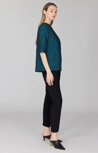 Morgan is 5' 11" and wearing Turquoise in size XS.