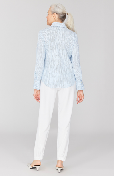 Fabienne is 5' 9" and wearing Blue in size XS.