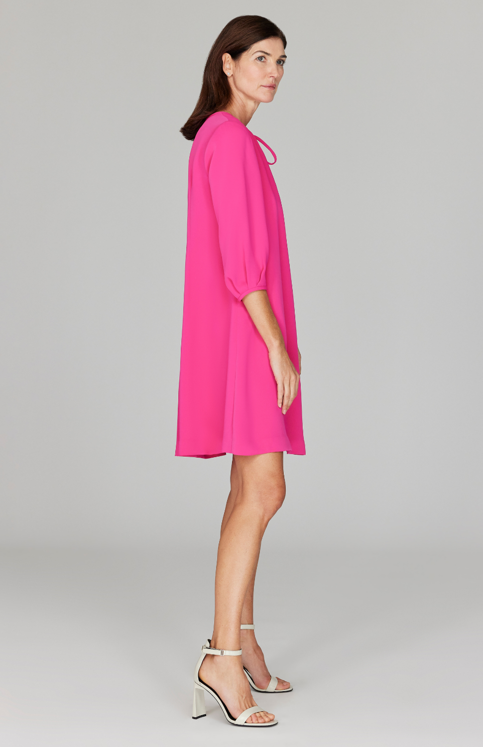 Ekaterina is 5'10" and is wearing a size XS in Pink.