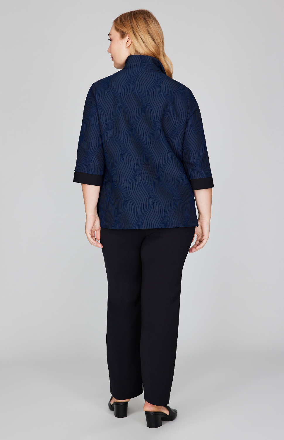 Madeline is 5'10" and wearing Midnight in size L.