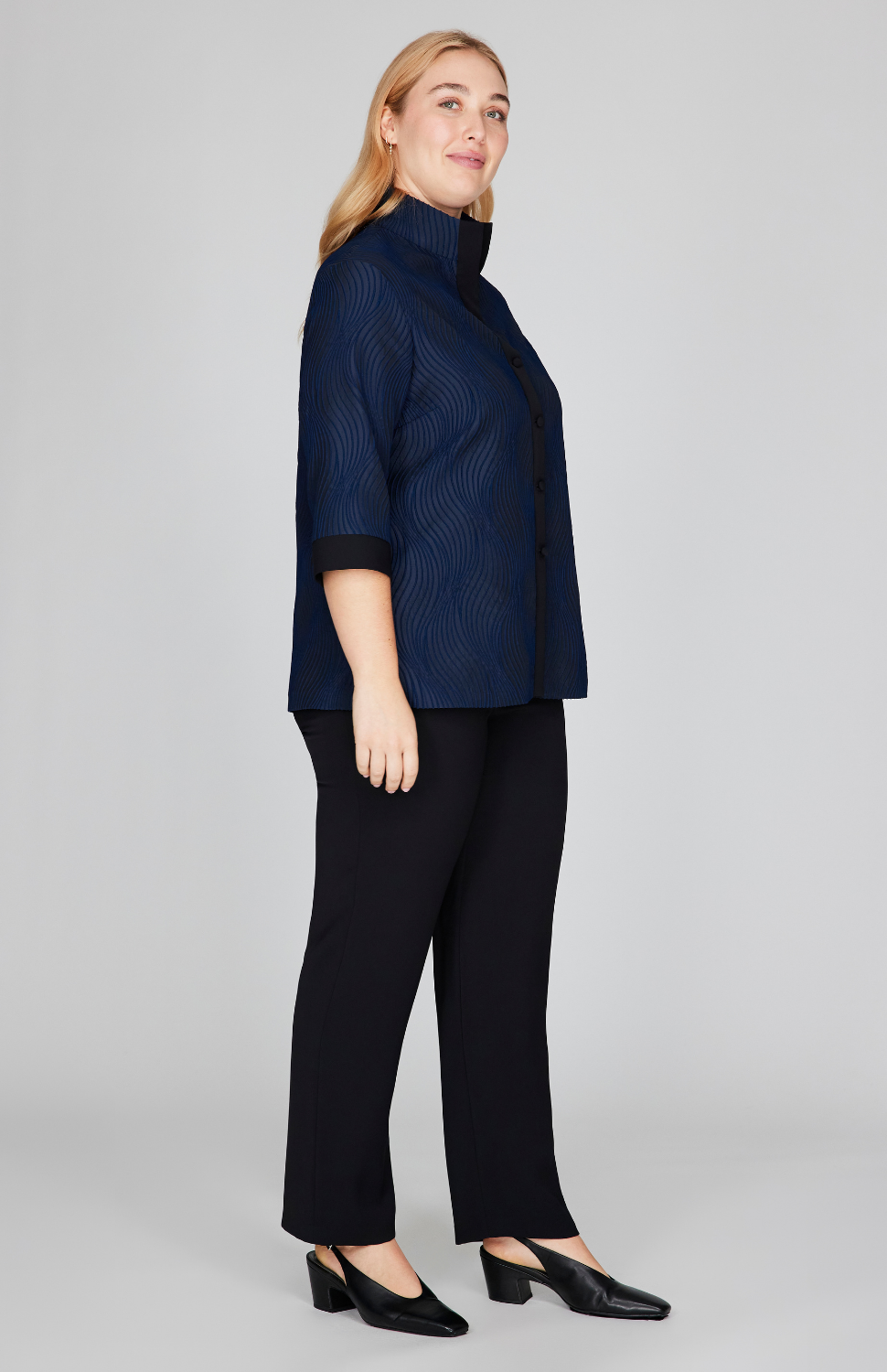 Madeline is 5'10" and wearing Midnight in size L.