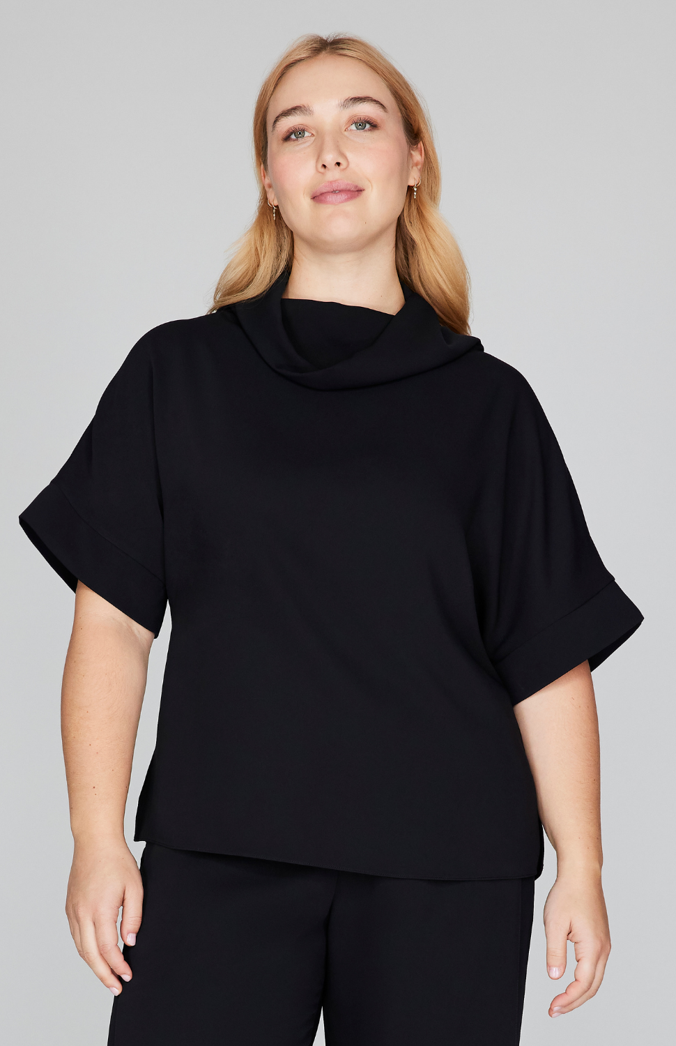 Madeline is 5'10" and wearing Black in size M.
