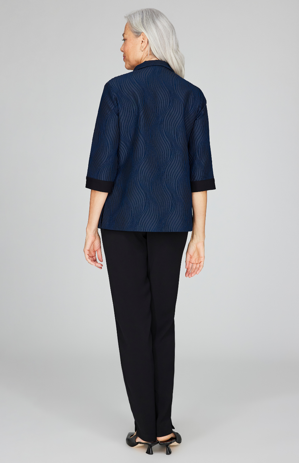 Fabienne is 5'9" and wearing Midnight in size XS.