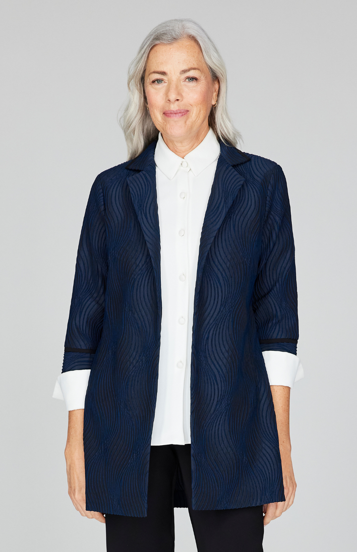 Fabienne is 5'9" and wearing Midnight in size XS.
