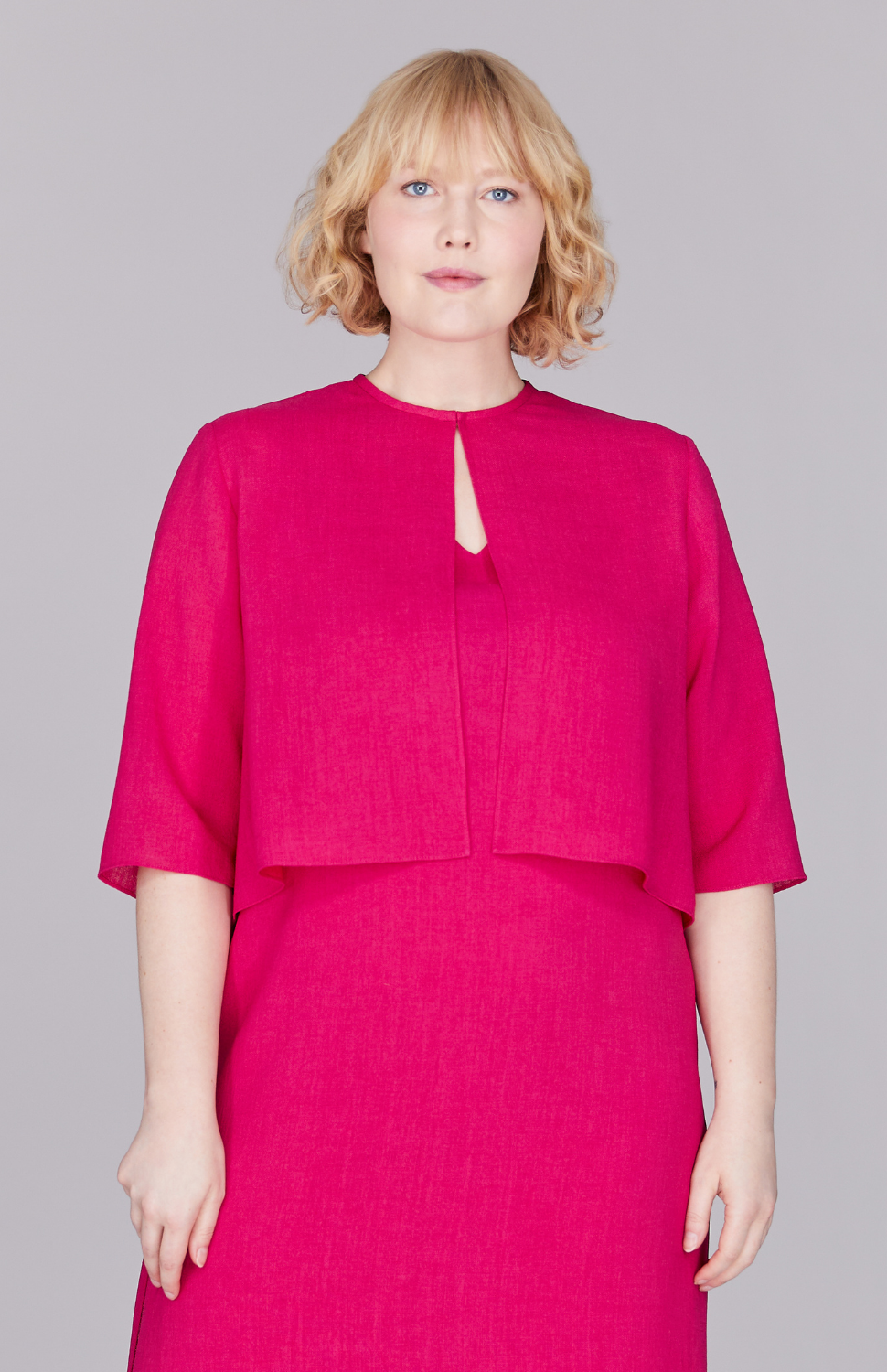 Molly is wearing Fuchsia in size L.