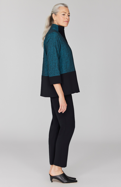 Fabienne is 5' 9" and wearing Turquoise in size XS.