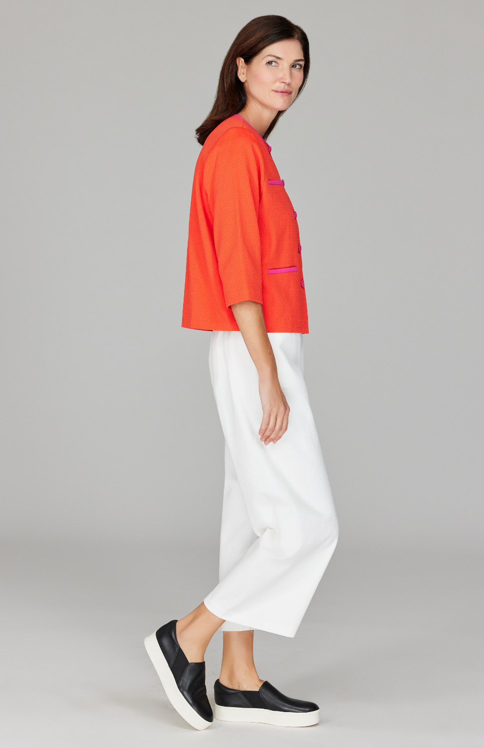 Ekaterina is 5'10" and wearing a size XS in Orange.