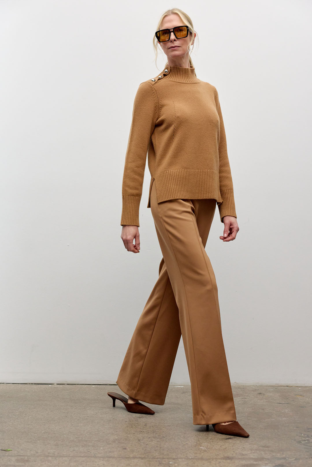Mock neck long sleeve top with shoulder buttons