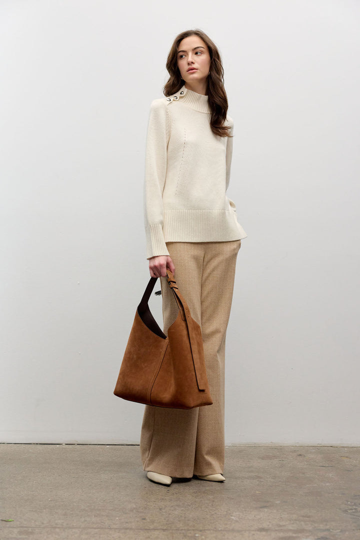 Mock neck long sleeve top with shoulder buttons