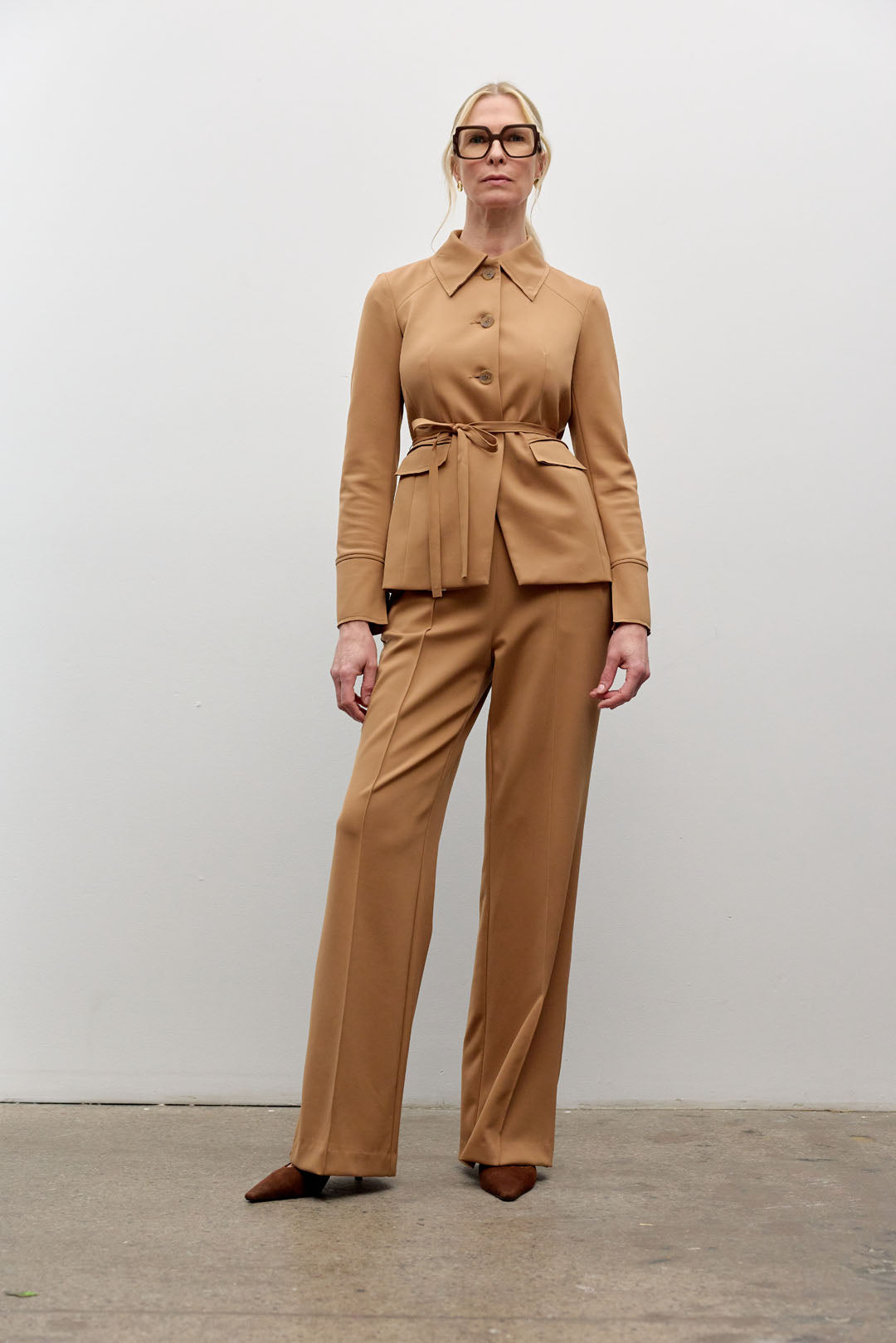 Belted jacket with flap pockets
