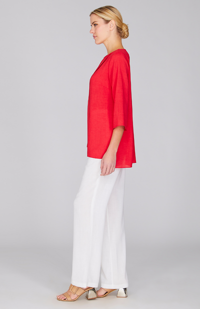 Gabby is 5'10" and is wearing a size XS in Hibiscus.