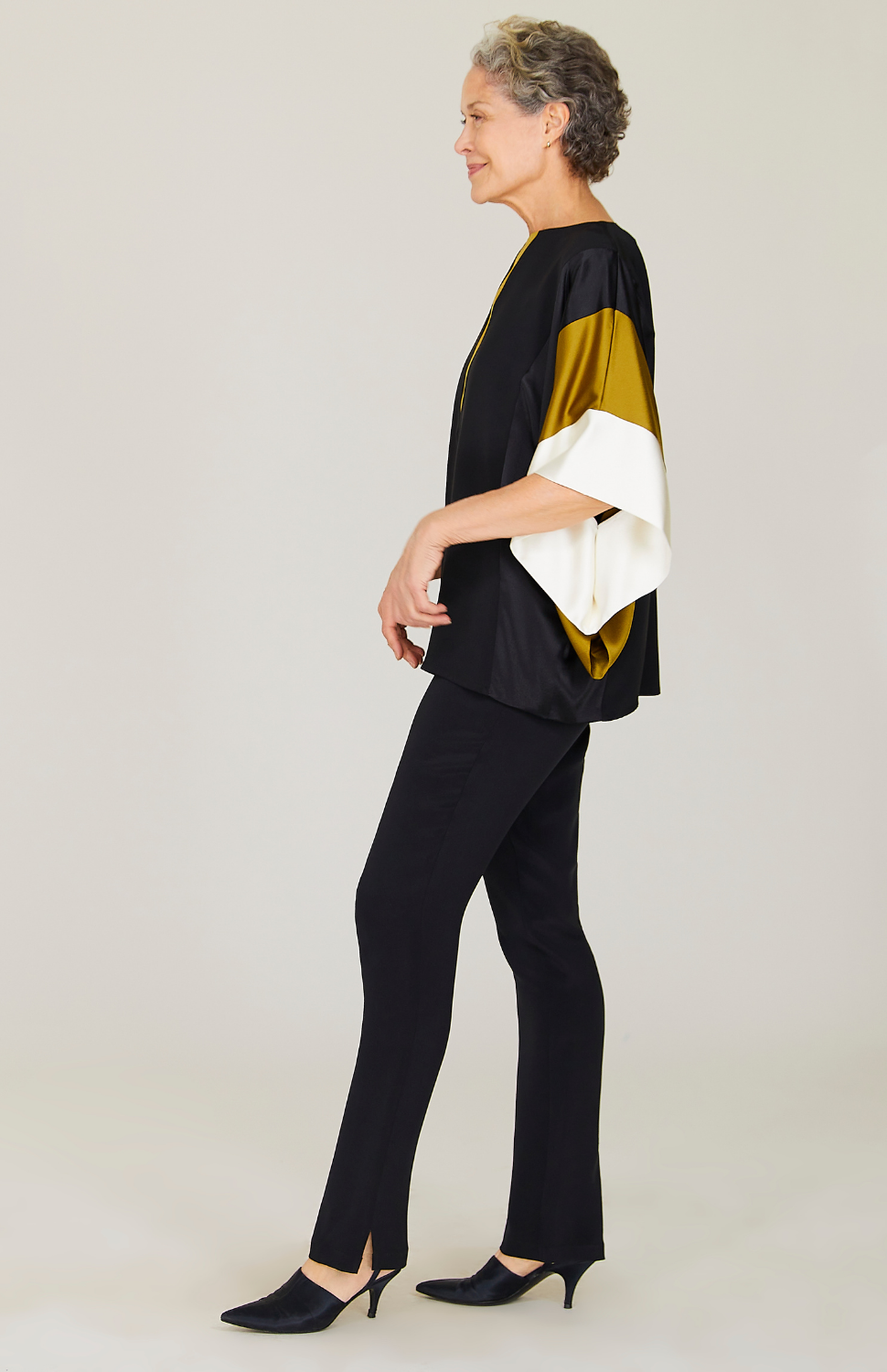 Nancy is 5'10 and wearing Luster 2 in size 00.
