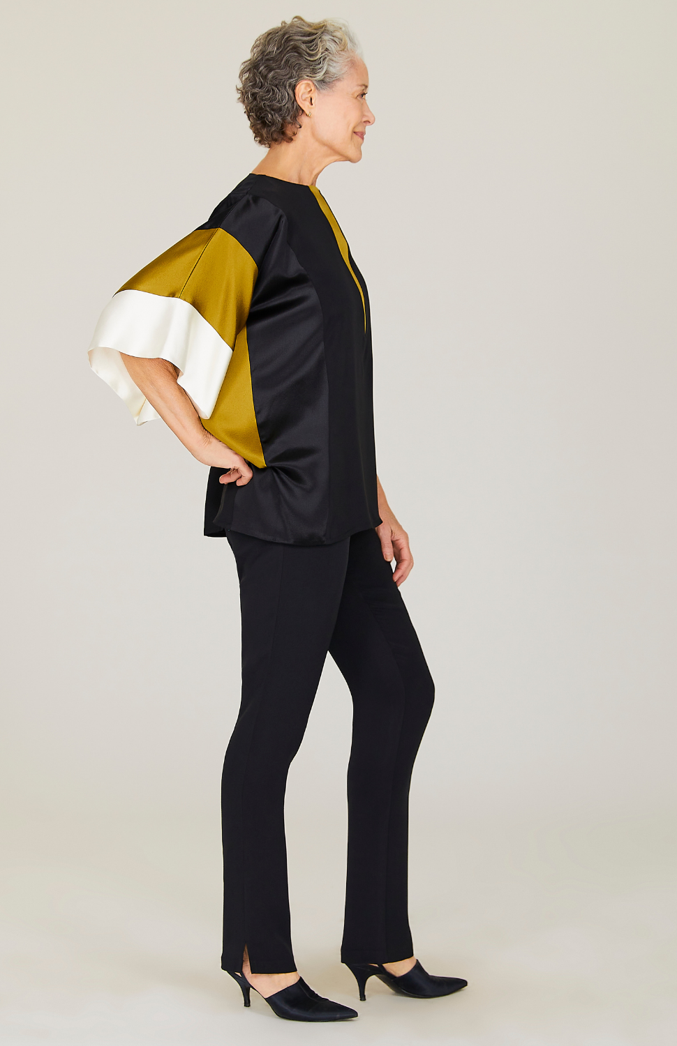 Nancy is 5'10 and wearing Luster 2 in size 00.