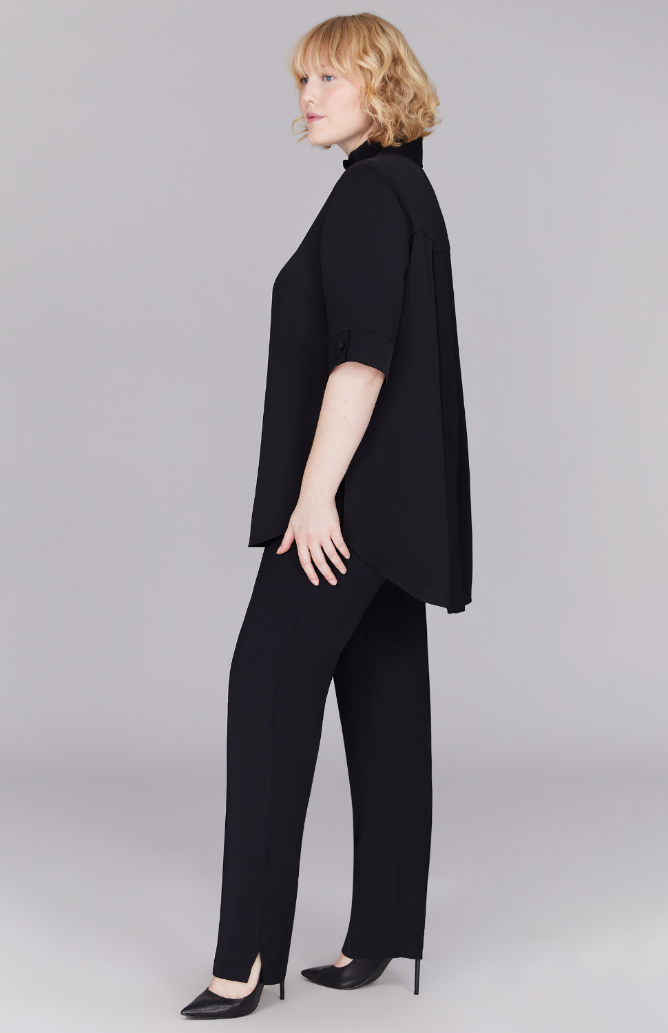 Molly is 5'8.5" and wearing Black in M.