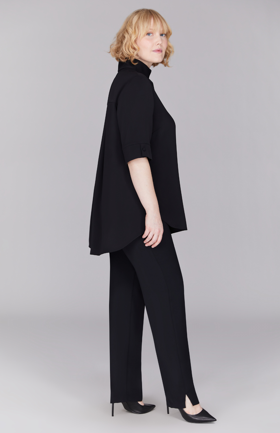 Molly is 5'8.5" and wearing Black in M.