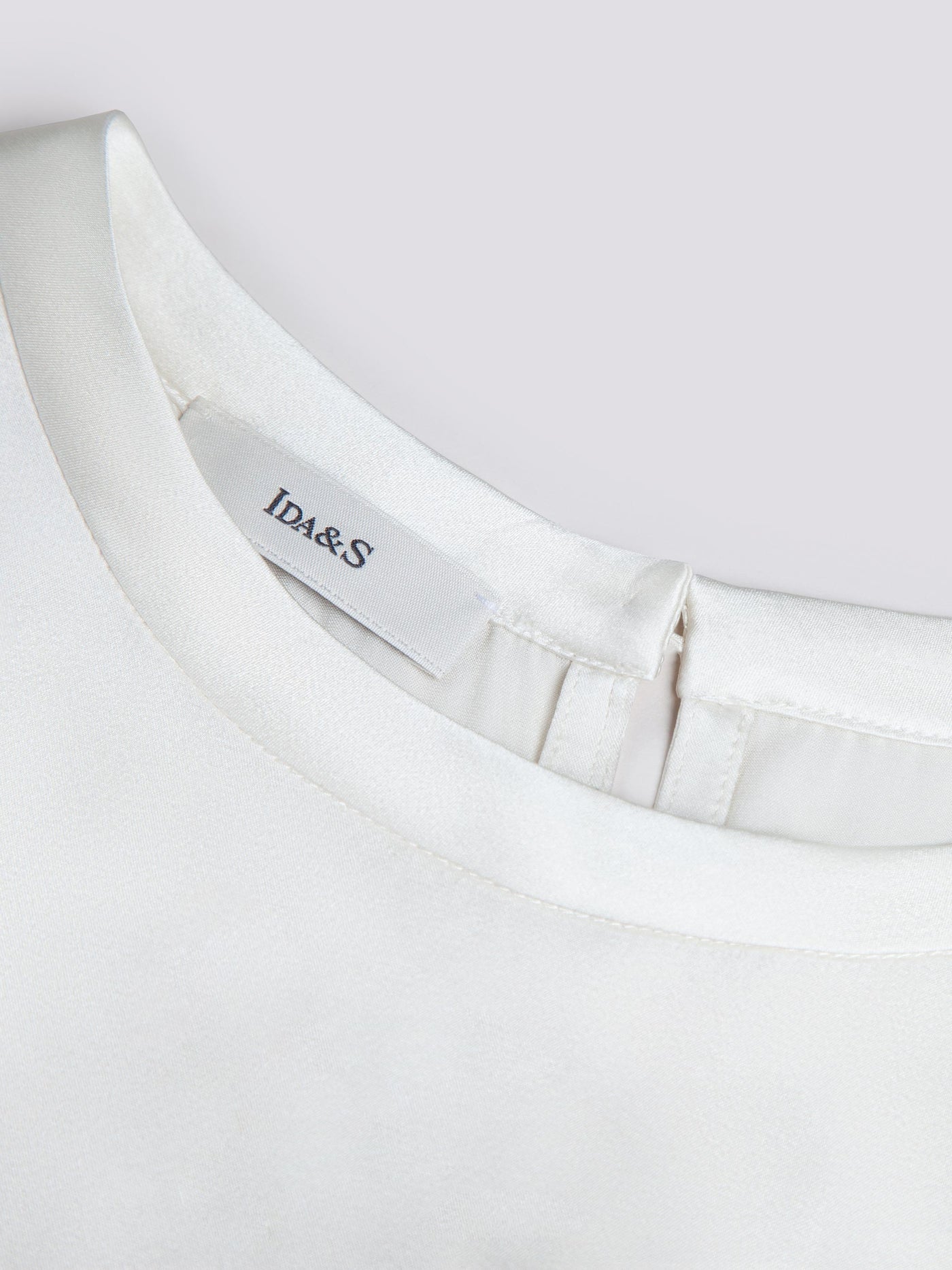 OPEN NECK CAP SLEEVE SILK BLOUSE W/ CHAIN DETAIL