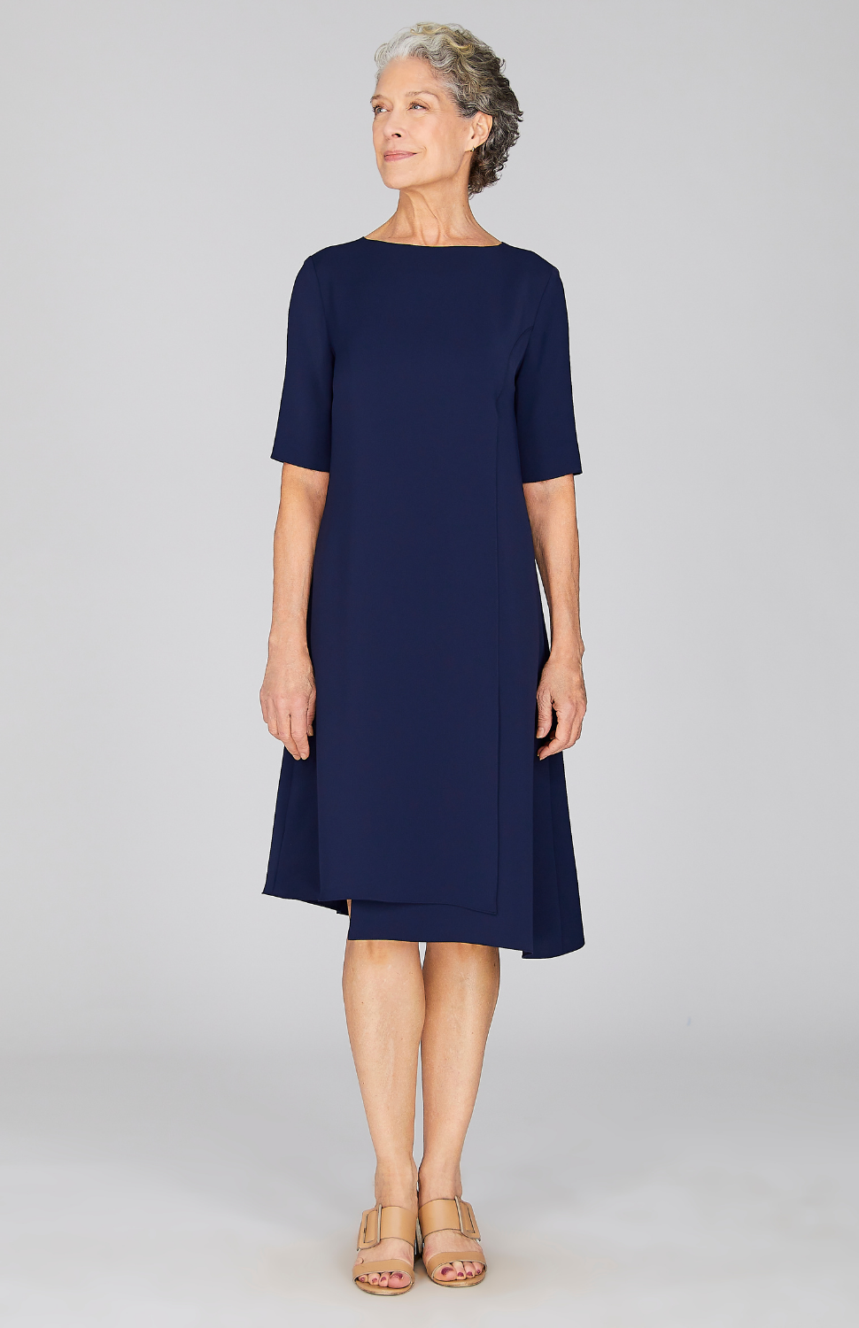 Nancy is 5'9" and wearing Midnight in XS.