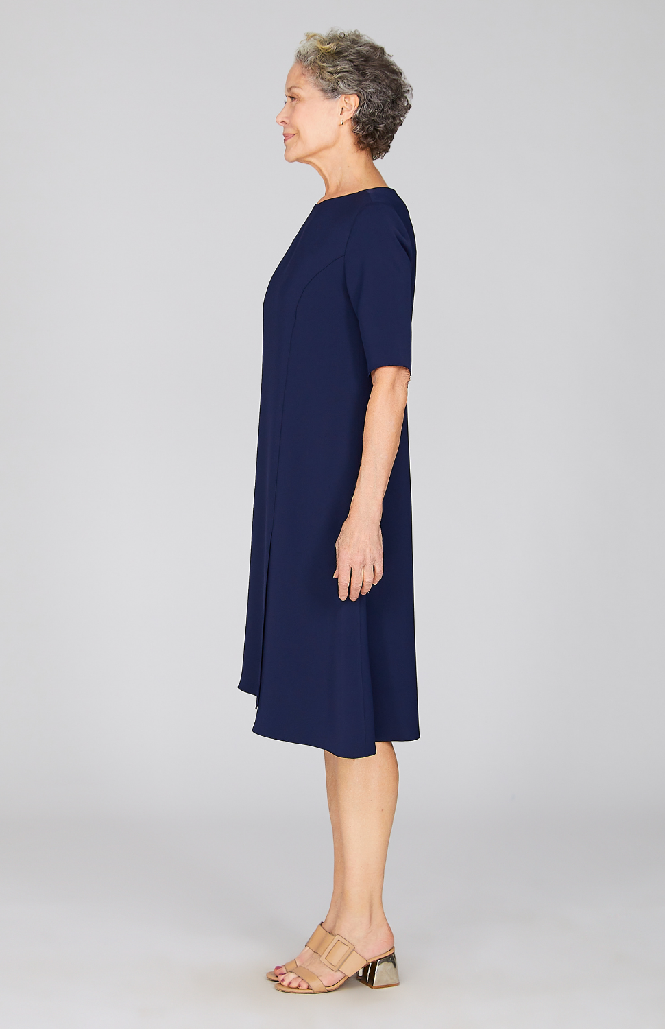 Molly is 5'8.5" and wearing Midnight in M.