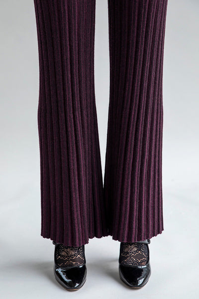 Close-up of Marcelle Trousers in aubergine, highlighting the texture and materials: polyamide, baby alpaca, and silk.