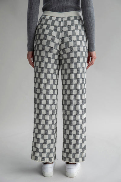 Back view of Zoe Trousers reversed, showcasing the lighter colorway and versatile design. Waistband is ivory.