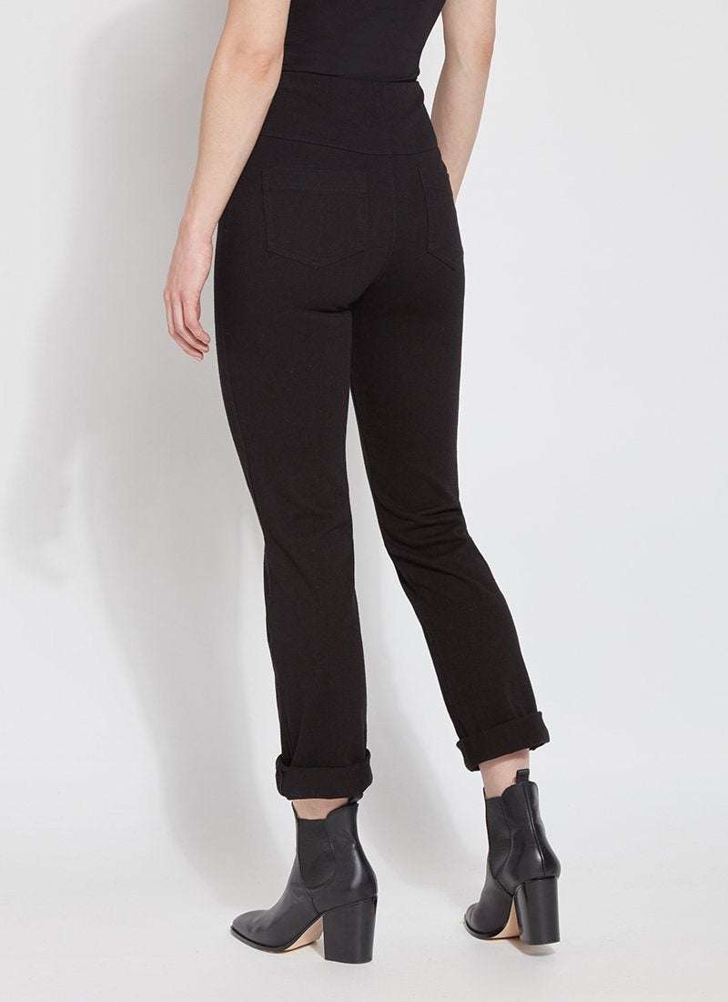 color=Black, Angled rear view of black, 4-way stretch, relaxed boyfriend denim jean legging, seen from waist down