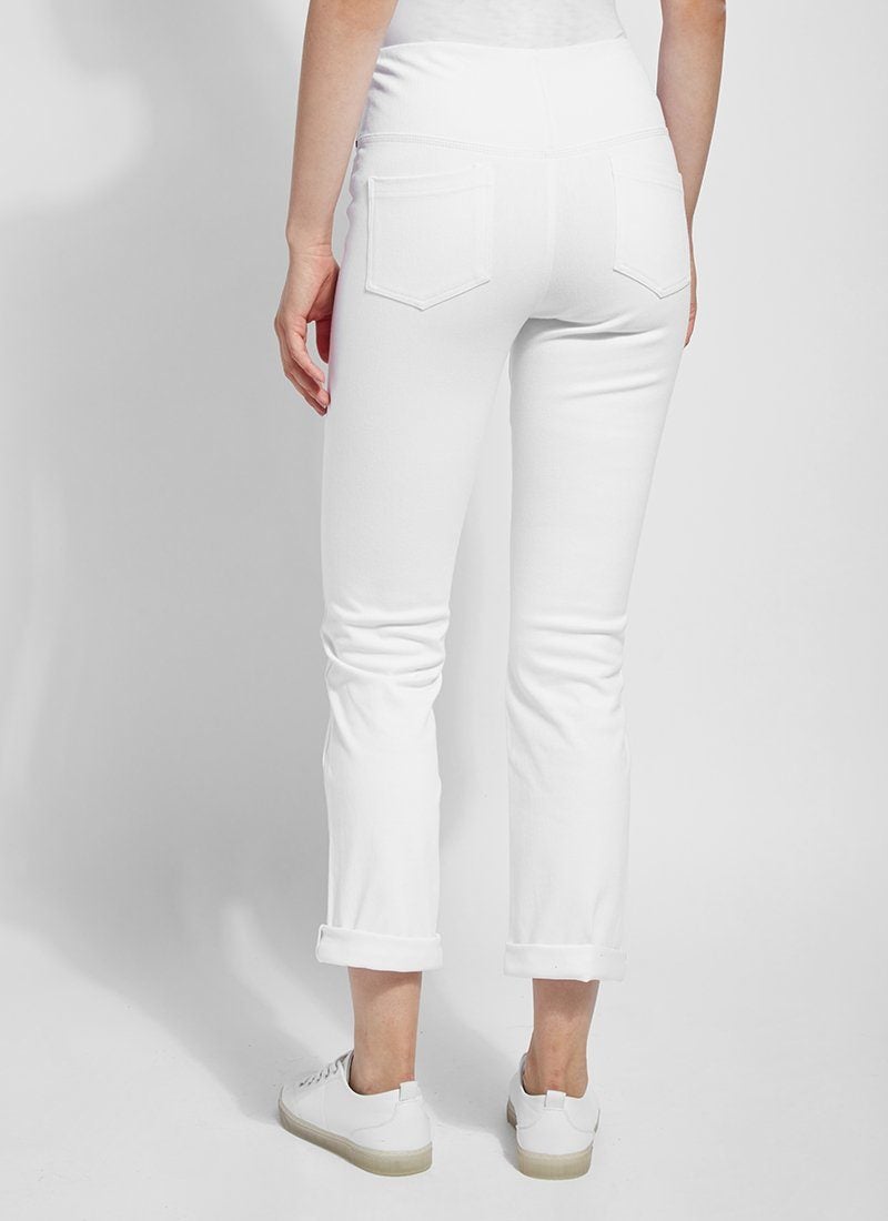 color=White, Rear view of white, 4-way stretch, relaxed boyfriend denim jean legging, seen from waist down