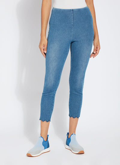 color=Mid Wash, summer denim jegging with scalloped hemline. Cropped, slim legging with comfort waistband