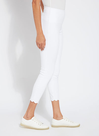 color=White, side view, comfortable summer denim jegging with scalloped hemline. Cropped, slim legging with comfort waistband